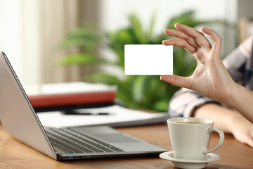 Student hand showing credit card mock up