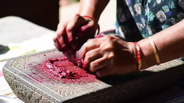 Beetroot Grinding Process With Traditional Stone Tool In Kitchen