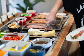 scooping the food, catering, dinner time