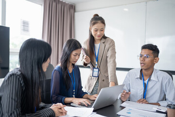 Fototapeta premium Business asian People Meeting Design Ideas collaboration Professional team brainstorming &nbsp;for project working together colleagues investor Group asian employees talking in boardroom
