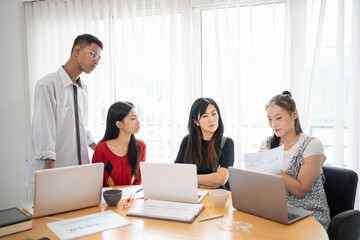 Obraz premium Business people group diverse colleagues team discuss project in bright modern office Startup Diversity Teamwork Brainstorming.