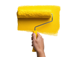 Closeup of hand holding paint roller, applying vibrant yellow paint on surface, showcasing creativity and home improvement. image captures essence of DIY projects and artistic expression