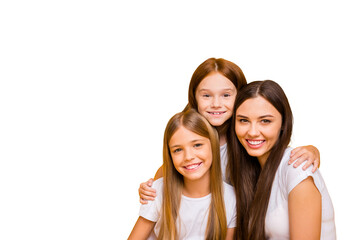 Photo of three amazing ladies of different age hugging wear casual clothes isolated yellow...