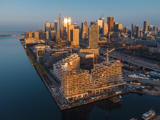 Toronto skyline with modern architecture and waterfront.