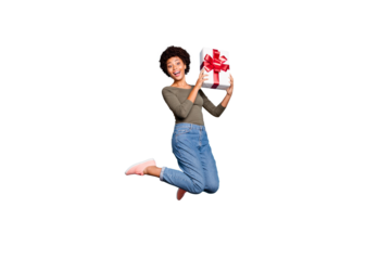 Full length body size photo of excited crazy cheerful nice positive ecstatic woman wearing jeans denim holding giftbox with hands jumping up isolated with vivid color blue background