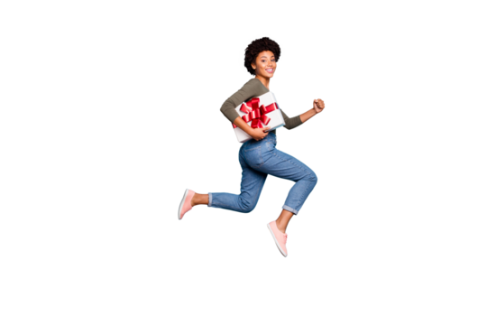 Full size photo profile side of dreamy curly hair mulatto girl hold gift box dream jump run to best friend 8-march celebration party wear green pullover denim jeans isolated blue color background