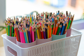 colored pencils in a box