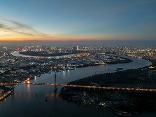 Spectacular twilight view of Phu My bridge and Ho Chi Minh city's skyline along the Saigon River