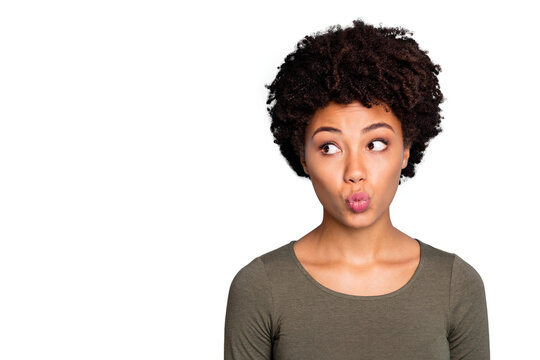 Portrait of negative anxious dark skin girl with lips pouted plump look stare made mistake worry  wear style clothes isolated over blue color background