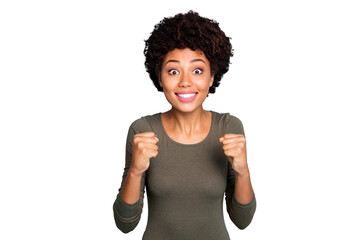 Portrait of funny funky mulatto girl raise fists watch football match please want her team win hope...