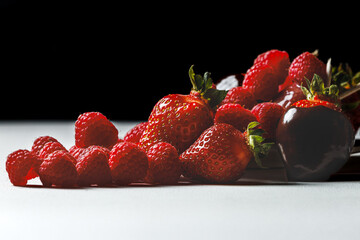 Elegant Chocolate-Dipped Strawberry & Raspberry Medley on Black