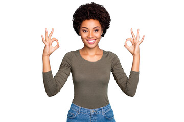 Portrait of cool positive promoter young afro american girl show ok sign advise excellent ads...