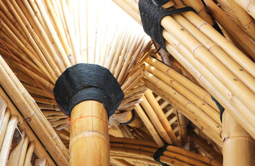 Bamboo column structure joints and fibre rope joinery techniques tropical style.