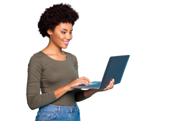 Portrait of positive cool confident afro american girl freelancer use laptop type emails chat with her partners business clients wear green style clothes denim jeans isolated blue color background