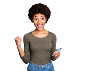 Yes more followers! Portrait of cheerful curly hair mulatto girl hold use smartphone get notification celebrate lottery victory raise fist scream wear green pullover isolated blue color background