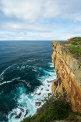 Towering Sandstone Cliffs Over Turquoise Ocean Waters Sydney Coastline, Watsons Bay