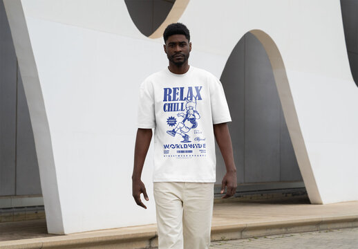 Mockup Of Man Dressed In Customized T-Shirt Outdoors