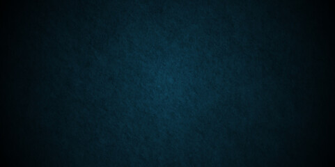 Dark Blue background with grunge backdrop texture, watercolor painted mottled blue background, colorful bright ink and watercolor textures on black paper background.