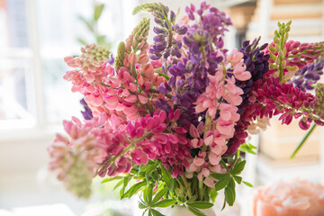 Naklejka premium Beautiful bouquet of pink and purple lupines