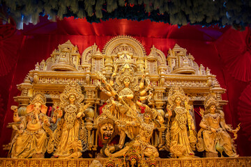 Grand Durga Puja Celebration in Kolkata with Decorated Idols of Goddess Durga, Lakshmi, Saraswati, and Ganesha