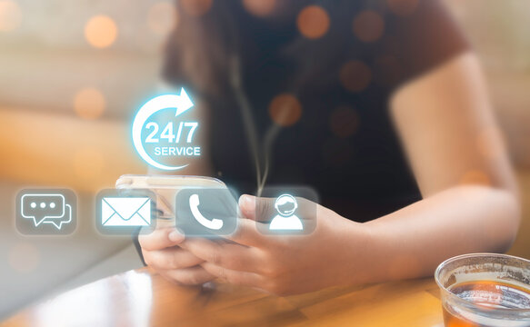 Women use 24/7 customer service center with communication icons, continuous support concept, online assistant and global business communication anytime, anywhere.