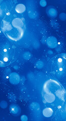 Abstract Blue Bokeh Lights Background with Sparkling Effect