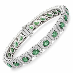 Obraz premium A luxurious bracelet featuring radiant orange diamonds, elegantly set in gold, offering a bold, vibrant statement of sophistication and style.