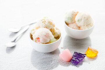 Milk yogurt and jelly ice cream in a white bowl.