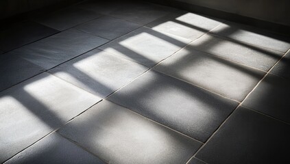 Sunlight patterns on light gray tile floor