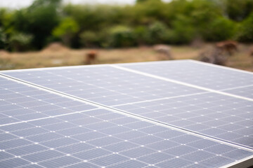 Solar cells with blur nature background, save the power
