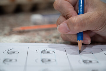 close up pencil on hand, drawing