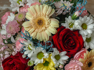 bouquet of colorful flowers, daisy, carnations, dahlias, roses, gypsophila, limonium and others, top view