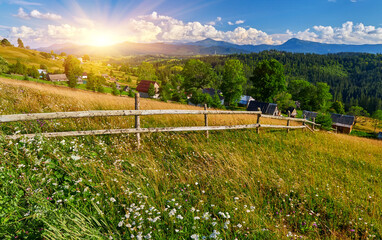 Fototapeta premium Mountain Meadow Fence Village Landscape