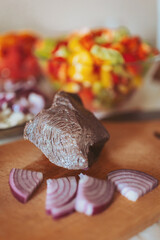 Delicious preparation of fresh vegetables and beef in a vibrant kitchen setting