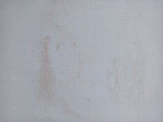 Subtle White Plaster Wall with Faint Reddish Stains