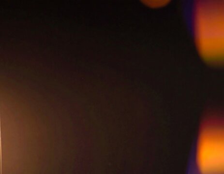 Abstract lens flare on dark background