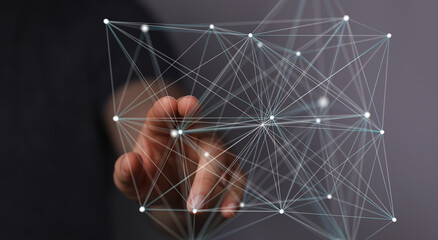 Abstract image of a hand interacting with a digital network, representing connection, technology,...