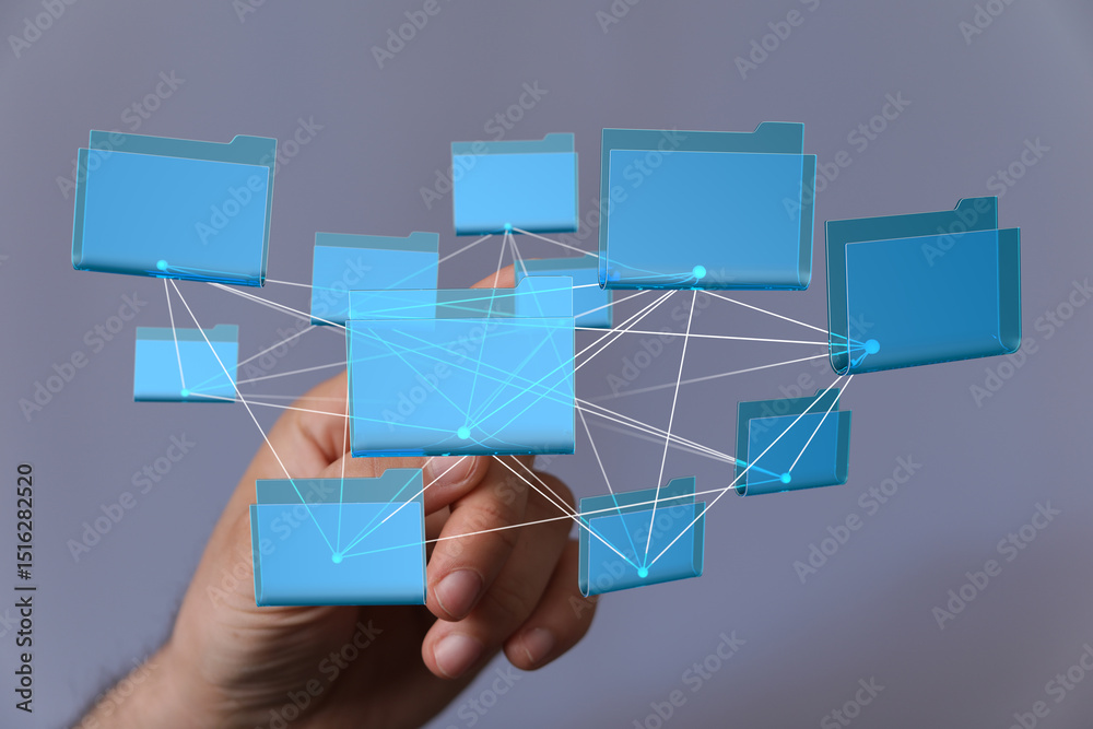 Poster Hand interacting with a network of digital files.  Illustrates cloud storage, data sharing, and network technology.