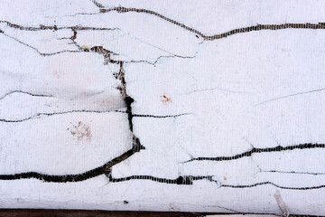 old cracked plastic pvc