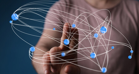 Abstract image of a hand interacting with a digital network, representing connection and...