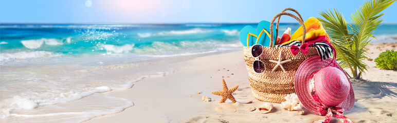 Beach Vacation - Bag And Accessories On Tropical Sand With Defocused Ocean - Summer Holiday