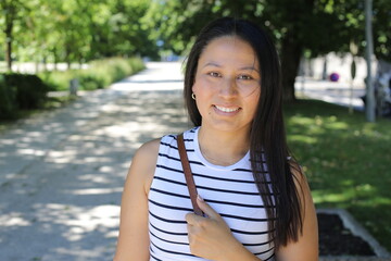 Ethnic woman outdoors close up
