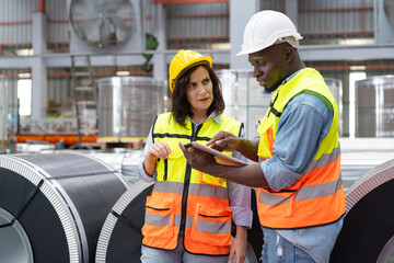 female engineer supervisor advice technician foreman to inspect and check spare part equipment of...