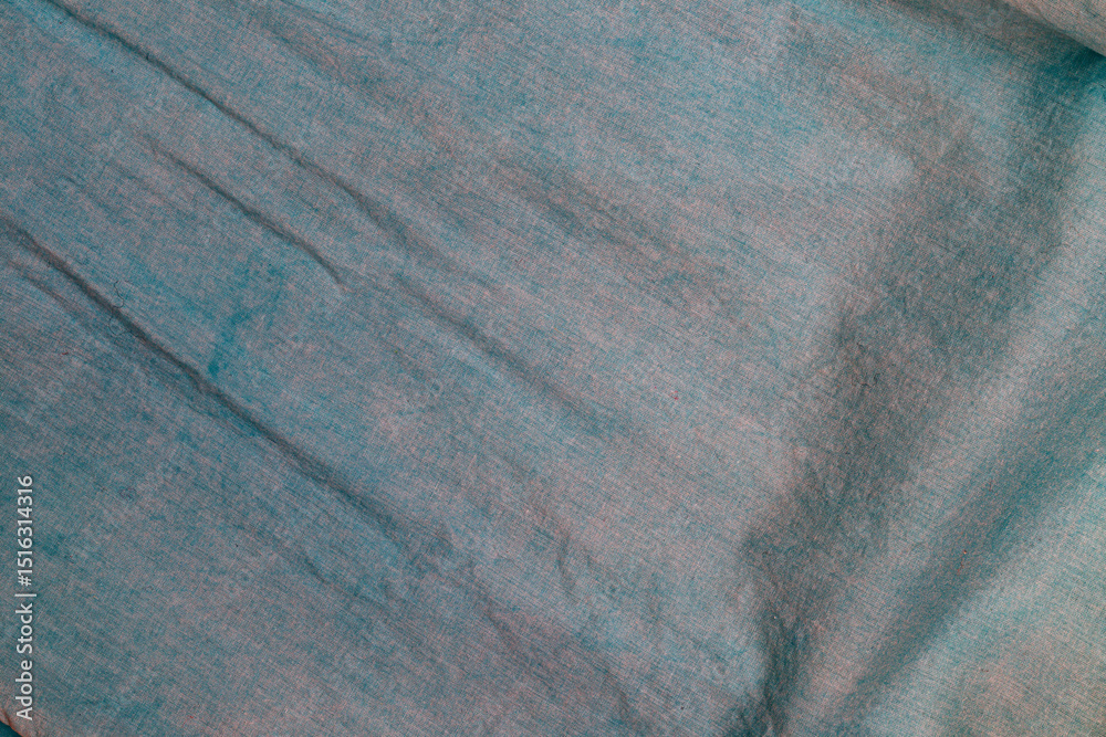 Poster Handcrafted textile showcases natural texture and subtle color variations in a sunny artisan workshop setting