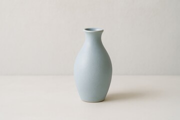 Minimalist blue vase design on neutral background for home decor