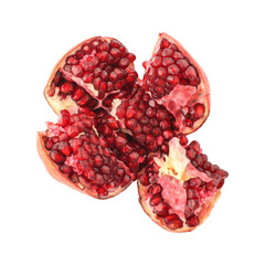 Fresh ripe pomegranate segments with juicy red seeds isolated on transparent background