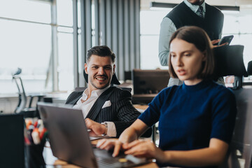 A diverse group of business people working together in a modern office setting. The image showcases...