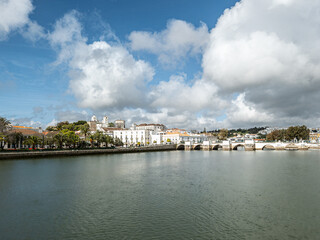 Historic bridge crossing river Gilao in Tavira