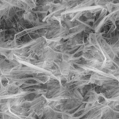 White asbestos fibers creating a dangerous texture background