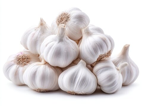 Fresh garlic bulbs in a pile.  A close-up view of several whole garlic heads clustered together.  The bulbs are a vibrant white color and appear fresh and healthy - Powered by Adobe